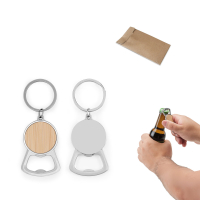 MEEKO. Żelazny brelok o okrągłym kształcie, wykonany z cynku i bambusa